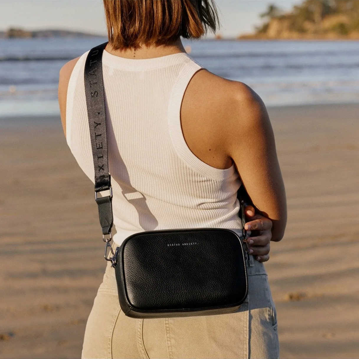 STATUS ANXIETY Plunder with webbed strap - black