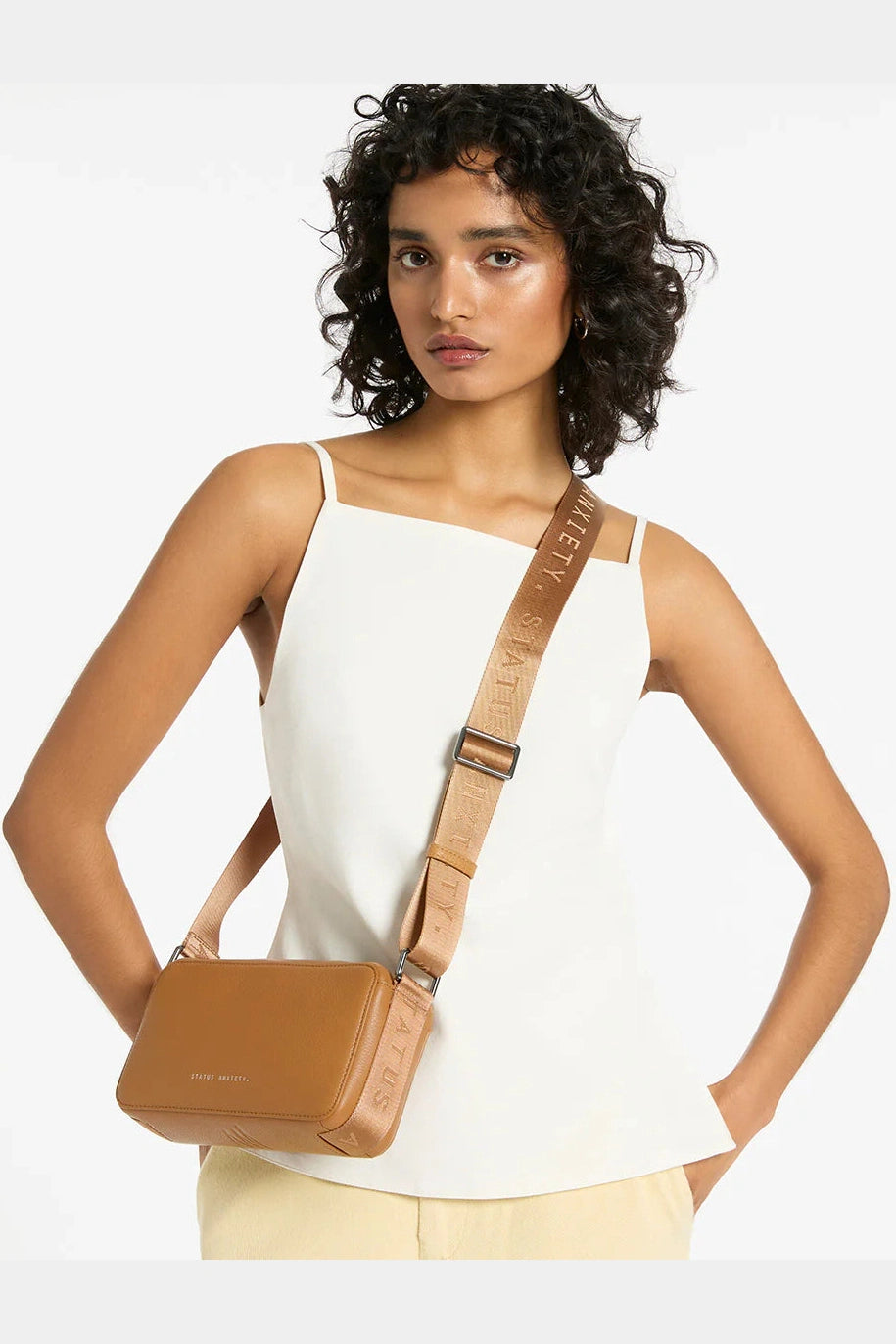 STATUS ANXIETY Delirium - Tan