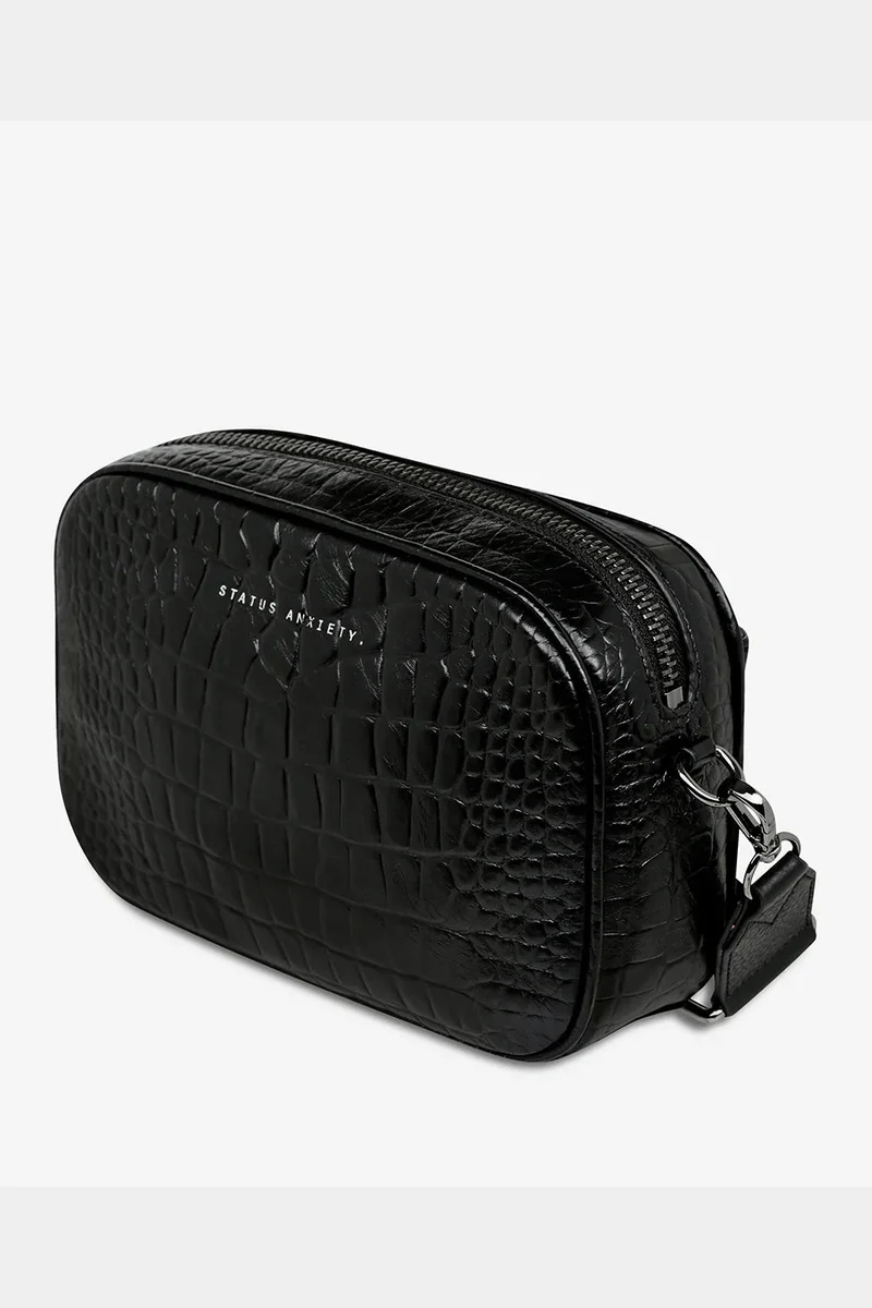 STATUS ANXIETY plunder with webbed strap - Black croc emboss