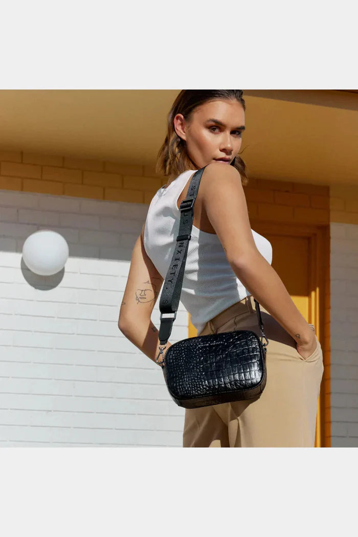 STATUS ANXIETY plunder with webbed strap - Black croc emboss