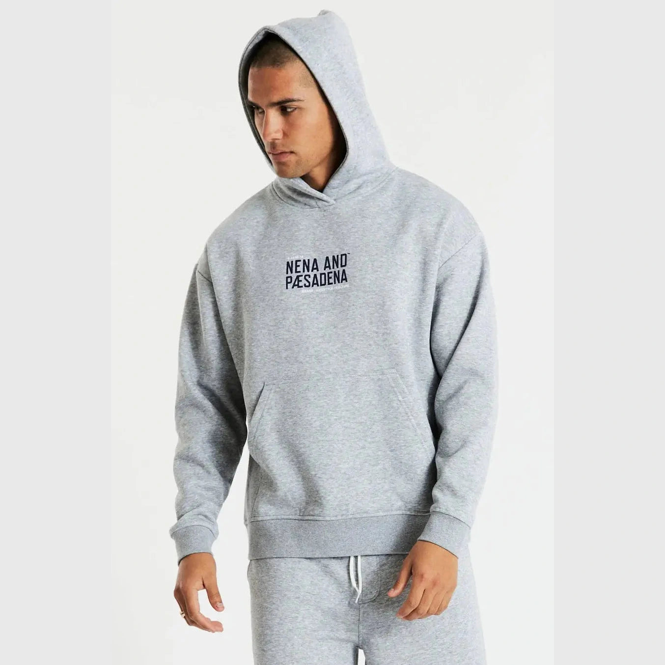 Nxp tournament relaxed hooded sweater- grey marle